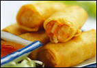 Golden appetizers served with chopsticks