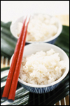 Rice bowl with red chopsticks